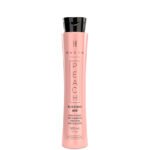 Soft straightening keratin treatment in a peach bottle for fragile, fine hair
